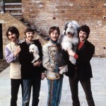 The Beatles pose in Ringo Starr’s backyard, 1967. McCartney holds his sheepdog Martha, who would later be the inspiration for the song “Martha My Dear"