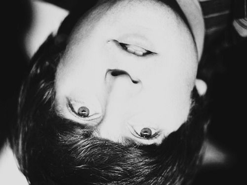 Upside down John Lennon, looks like Paul McCartney