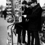 Paul McCartney, George Harrison and John Lennon of the Beatles pop group looking at postcards in Paris. January 1964