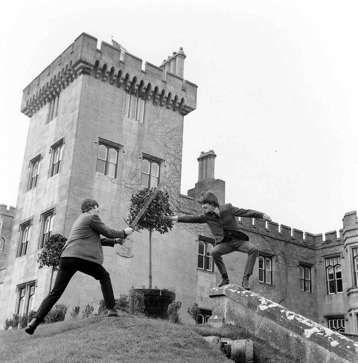 John Lennon and George Harrison on an Easter weekend holiday with Cynthia and Pattie to Dromoland Castle Ireland. 27 March 1964